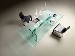 Glass is bent to form the frame which also gives it rounded corners. Llt The Glass Table Fiam Italia