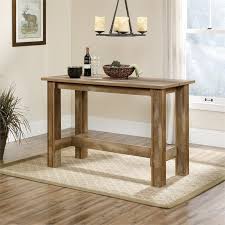 Back is inverted toward the center. Boone Mountain Engineered Wood Counter Height Dining Table In Craftsman Oak 416698