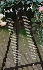 Make a cool hanging seating chart with wreath forms, greenery and tags, try hanging half moon seating chart for a celestial wedding or go for a crazy archery seating chart with arrows and a seating plan on them. 11 Unique Table Plan Ideas For Your Big Day Wedinspire