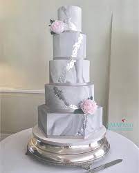 Draw a skewer lengthways through the lines to create a feathered effect. Marble Cake Amazing Grace Cakes Bespoke Cake Designs Based In Hampshire Surrey Uk