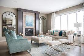 Today's post is about 3 ways to style a coffee table or ottoman. How To Position And Style Coffee Tables And Ottomans