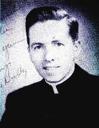 I believe this picture shows Bill McCabe as well as myself as we were  confirmed at Sacred Heart Church. Hope that Bill sees this. The person in  between Bill and myself is