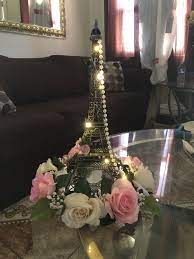 At each place setting, set a parisian picture frame as a place card holder, an eiffel tower goblet, and an eiffel tower candle. Paris Table Centerpieces Paris Done By Princess Elvira Ig Paris Themed Wedding Centerpieces Paris Theme Wedding Paris Theme Party