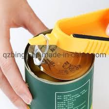Open the arms of the can opener. China Plastic Can Opener Hime Use Opener Or Bar Use Opener China Bar Opener And Home Opener Price