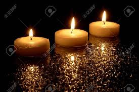 Three Lit Candles On A Black Background Stock Photo Picture And Royalty Free Image Image 18091112