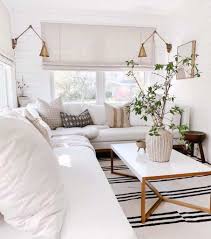 Consider positioning a long coffee table directly in front of the sofa. The Top 96 Coffee Table Ideas