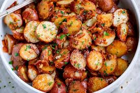 Roasted Garlic Potatoes With Butter Parmesan Best Roasted Potatoes Easy Potato Recipes Parmesan Potato Recipe Potato Side Dishes