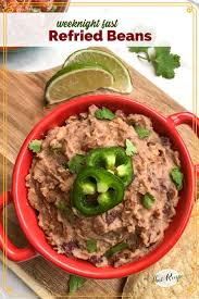 Weeknight Fast Spicy Refried Beans Recipe In 2020 Vegetarian Refried Beans Recipes Taco Side Dishes