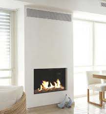 17 Poeles Et Cheminees A Bois Design Et Economiques Avec Images Cheminee Design Salon Avec Cheminee