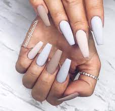 Begin by priming the nails and applying the nail forms. White Light Grey Acrylic Nails Coffin Nail And Manicure Trends