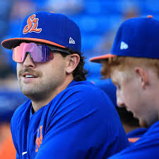 Randy Guzman, first baseman for the SL Mets, hit not once but twice with  the same pitch in game one of the series with the Jupiter Hammerheads.  #stluciemets #cloverpark #milb #mlb #helenehaesslerphotography #
