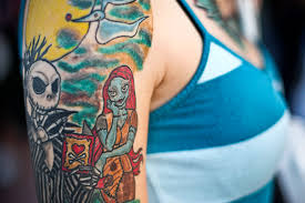 Batman, superman, the flash, and green lantern logos. Geek Ink Comics Fans Show Off Tattoos Wired
