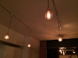 But under any label, they are what's in for many folks who want a classic look and feel. Easy Fix Boring Old Track Lighting Turned Into Awesome Vintage Style Cage Lighting Parts From Www Snakeheadvi Diy Light Fixtures Homemade Lighting Cage Light