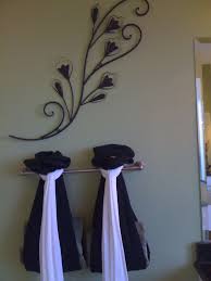 Unique Tie Back For Guest Bathroom Towels I Did Something Similar Using Tasseled Curtain Tie Backs Guest Bathroom Towels Bathroom Towels Bathroom Towel Decor
