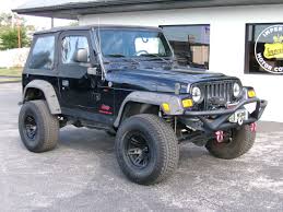 Image result for Brilliant Black 2005 Jeep