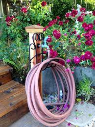 Diy Hose Holder Faucet 4x4 Wood Metal Holder Faucet Garden Hose Holder Patio Yard Ideas Amazing Gardens