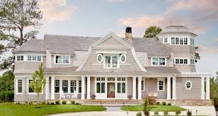 Windows are typically surrounded by shutters. The Characteristics That Define A Cape Cod House