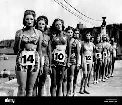 A perfect figure contest was held at Margate Lido today. Competitors wore  facial masks so that the judges should not be influenced by beauty of face.  ;September 1947 ;P010002 Stock Photo - Alamy