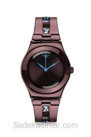 swatch saat modelleri kahverengi kordonlu tas detayli kiyafet kombinleri swatch bayan saatleri watches