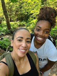 Mudi dog enjoying outdoor activities like camping and hiking