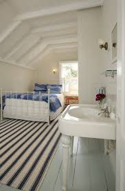 Old Homes Often Had Sinks In The Bedrooms Attic Rooms Painted Wood Floors Beach Style Bedroom