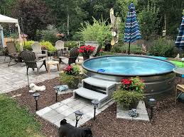 7 Inspiring Stock Tank Pool Ideas Stock Tank Swimming Pool Backyard Patio Designs Stock Tank Pool Diy