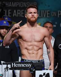 Saul 'canelo' alvarez produced a devastating uppercut to leave a distraught billy joe saunders unable to rise from his stool after eight rounds of their world title unification bout. Boxer Canelo Alvarez Poses On The Scale During His Official Weigh In Canelo Alvarez Saul Canelo Alvarez Boxer
