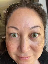 Finally got a photo of my youngest girls eyes, what colour are they?  They're like a amber, greeny/blue mash up. Hazel?