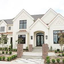 Black And White Exterior Modern Homes Pretty Soft Warm Off White Exterior With Brick And Charcoal And Black Windows Whiteexterior Ext House Styles Modern Farmhouse Exterior House Designs Exterior