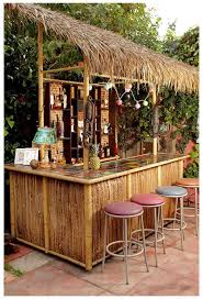The roof provides needed relief from that hot summer sun. 100 Diy Backyard Outdoor Bar Ideas To Inspire Your Next Project Outdoor Bar Ideas Tiki Outdoorbarideastiki Outdoor Tiki Bar Tiki Bars Backyard Outdoor Bar