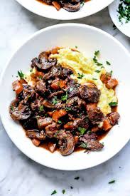 21 Holiday Recipes For Your Next Christmas Party An Unblurred Lady Beef Bourguignon Beef Bourguignon Recipe Beef Recipes