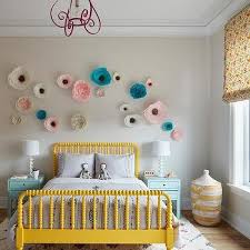 While most of the teenage girls' bedrooms are furnished with pink color, this white bedroom is highlighted with yellow. Yellow And Pink Girl Room Design Ideas