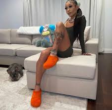 Coi Leray Relaxes at Home Wearing Fashion Nova Olive Green Ribbed Long  Sleeve Romper – Fashion Bomb Daily