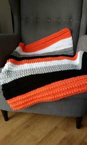Black And White Crochet Baby Blanket Pattern Bobble Stitch Crochet Baby Blanket In Orange Black Grey And White Baby Blanket Crochet Crochet Baby Bobble Stitch Crochet