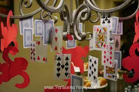 Starting with a base of primary colored party decorations can help to inexpensively fill in the space not decorated by games themselves and save money on tableware. Parties On A Penny Board Game Themed Birthday Party Board Game Party Game Night Parties Game Night Decorations