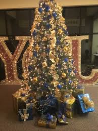 Photo about blue, green and gold decorations in a series of colour themed christmas trees photographed over white with soft shadow at the base. Royal Blue And Gold Christmas Tree Jfto Christmasdecor Treedecorating Royal Blue Christmas Tree Decorations Gold Christmas Decorations Blue Christmas Decor