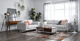 Modern Bright Vibes In This Living Room Featuring The Aquarius Collection Wood Furniture Living Room Living Room Decor Lights Gray And Taupe Living Room