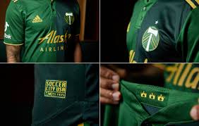 The portland timbers 2015 home kit is dark green and features a chevron graphic on the front, inspired by the club crest. Timbers Thorns Fc Partner With Tiktok Timbers Reveal 2021 Primary Jersey 750 The Game