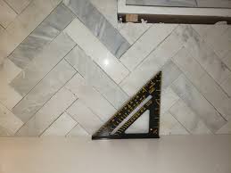 Maybe you would like to learn more about one of these? Crooked Marble Herringbone Backsplash Install Acceptable