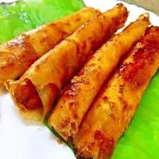Like other lumpia varieties, turon was also developed from the chinese spring rolls and represents one of the most common sweet versions of the dish. Toron Lumpia Wraper Outside Banana Inside Filipino Snacks Interesting Food Recipes Filipino Street Food Mechado Recipe