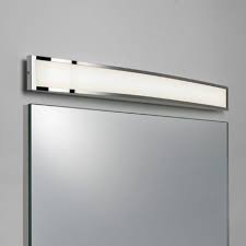 Featuring a classic finish and water glass style diffuser, this wall fixture conveys both quality and character. Chrome Over Mirror Bathroom Lights Trendecors