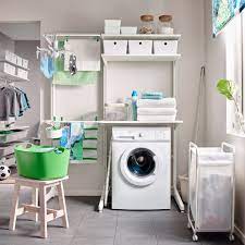Dormitorios de matrimonio en muebles boom tiendas de dormitorios matrimonio baratos, online y calidad al mejor precio: A Laundry Room With Floor To Ceiling Storage Consisting Of Drying Racks And Shelves Shown Together Laundry Room Storage Laundry Room Design Laundry Room Decor