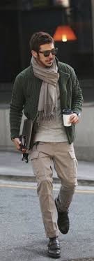 Fall Outfit Inspiration With A Olive Green Cable Knit Cardigan Gray Sweater Gray Scarf Tan Cargo Pants Su Scarf Outfit Men Casual Scarf Outfit Pants Outfit Men