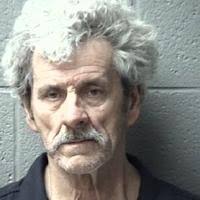 Vance man accused of breaking into church with headstone from grave