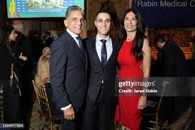 Adam Bavifard, Brianna Chenell and Jamison Weiner attend AFRMC 2022... News  Photo