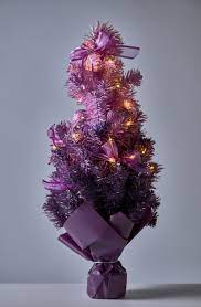 Female holding a purple christmas ball and decorative small tree. The Holiday Aisle Ombre Purple Fir Artificial Christmas Tree With 30 Clear Lights Reviews Wayfair