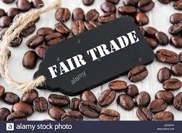 Folgers coffee is not bad it is just mediocre. Fair Trade Coffee Price Roasted Coffee Beans And Money Stock Photo Alamy