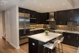 White cabinets with black countertops, a blue kitchen island with a white countertop and a wooden part seem very contrasting. 52 Dark Kitchens With Dark Wood Or Black Kitchen Cabinets 2021 Home Stratosphere