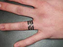 Pin By Black On Tattoo Ring Finger Tattoos Tattoo Wedding Rings Hand Tattoos For Guys