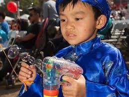 Faces at the Tet Festival and parade